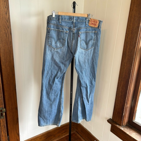 Levis 527 Low Bootcut Cowboy Medium Wash Denim Blue Distressed Jeans Mens 38x30 - Picture 3 of 9